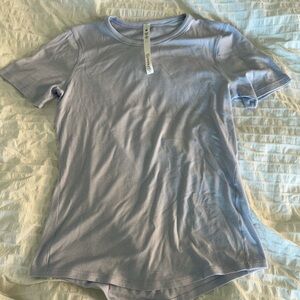 Lululemon hold tight t shirt in light blue. Size 10 excellent condition